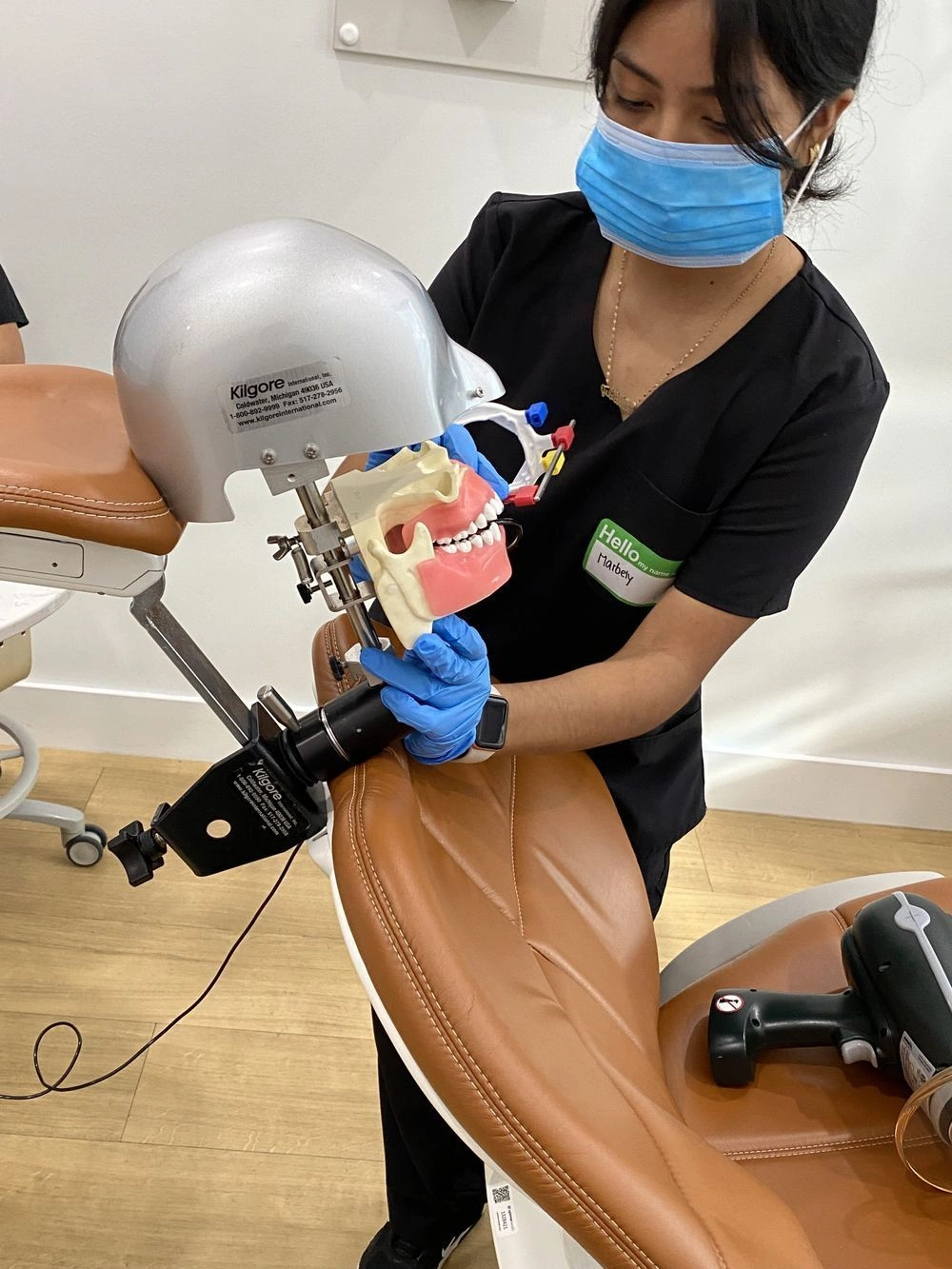 student training with dental assistant training equipment in class student training with dental assistant training equipment in class