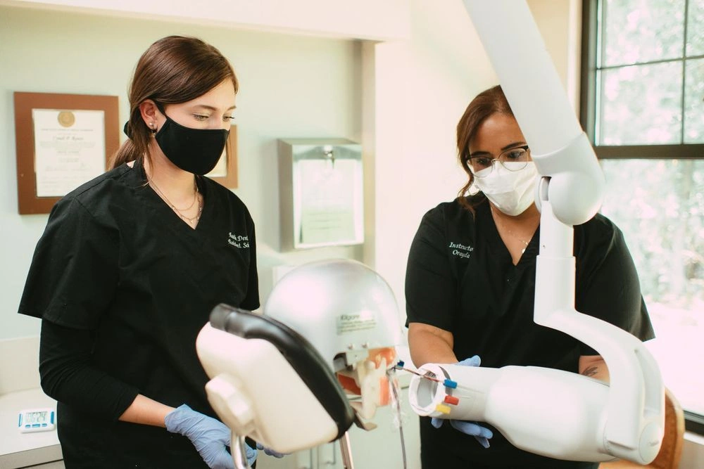 students training to capture dental x-rays students training to capture dental x-rays